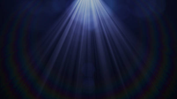 Real Lens Flare Shot in Studio over Black Background. Easy to add as Overlay or Screen Filter Photos