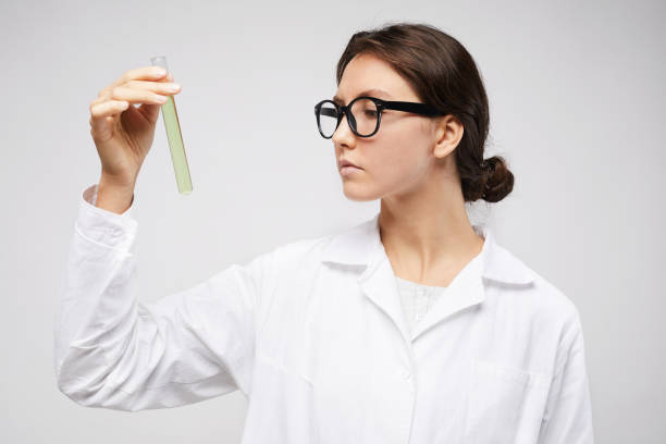 istock Young Female Scientist on White 1181396722