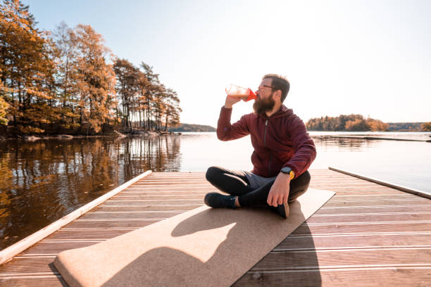 istock Man with a protein shake outdoors 1181399229