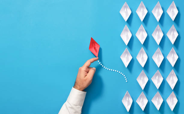 Leadership Concept with Paper Ship