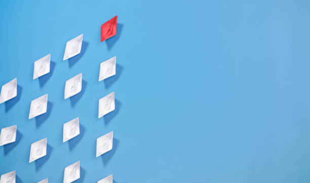 istock Leadership Concept with Paper Ship 1181400454