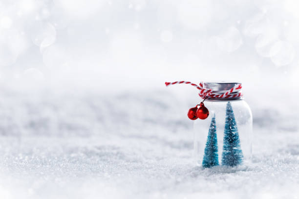 istock Christmas ornaments on snow 1181402102