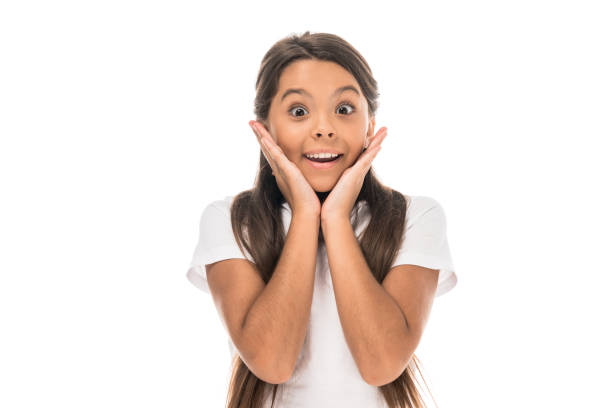 Facial expressions theme:  Happy Hispanic young woman with open arms and surprise  emotion. Standing in the living room.