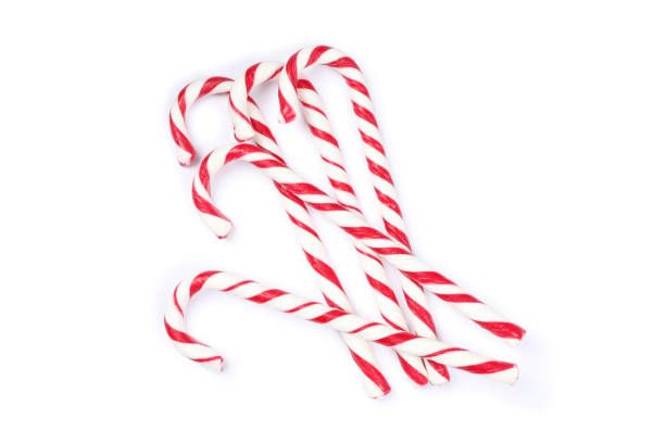 istock Sweet candy canes isolated on white background 1181407089