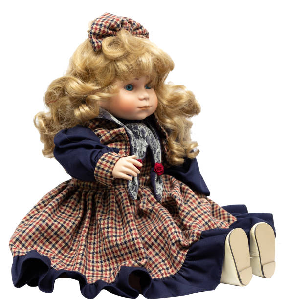 istock Ceramic porcelain handmade vintage doll, isolated on a white background. 1181408579