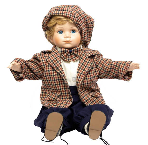 istock Ceramic porcelain handmade vintage doll, isolated on a white background. 1181408626