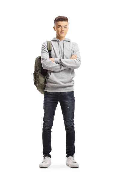 istock Male student standing and smiling at the camera 1181408651