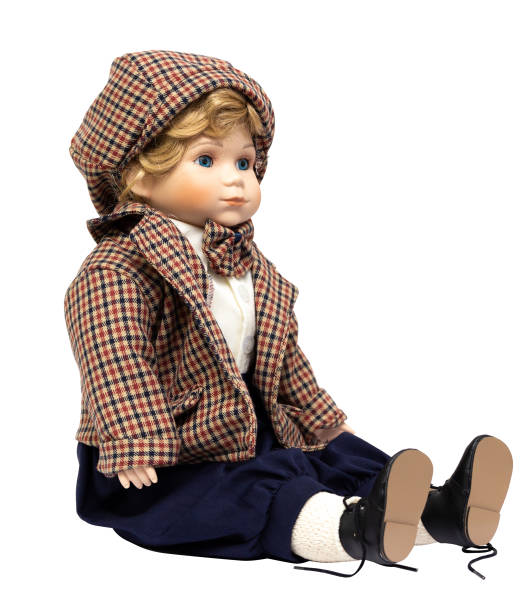 istock Ceramic porcelain handmade vintage doll, isolated on a white background. 1181408661