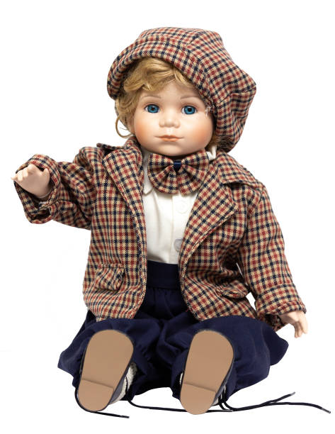 istock Ceramic porcelain handmade vintage doll, isolated on a white background. 1181408676