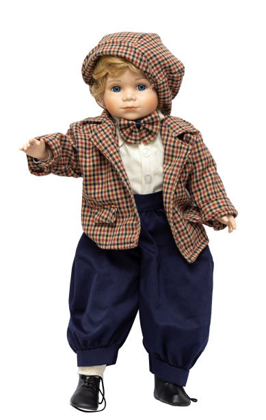 istock Ceramic porcelain handmade vintage doll, isolated on a white background. 1181408701