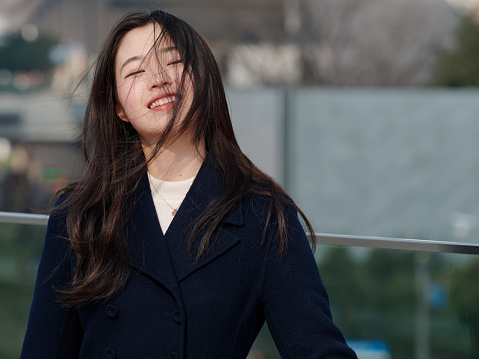 https://media.istockphoto.com/id/1181410047/photo/portrait-of-beautiful-young-asian-woman-with-black-long-hair-smiling-and-happy-in-wind-with.jpg?b=1&s=170667a&w=0&k=20&c=EP7-_iCihhLxqrxrBxw-PzAhuFobj3TM6CjGAan2zwk=