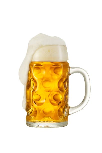 Big traditional glass of Bavarian beer isolated on white Big traditional glass of Bavarian beer isolated on white large german beer steins stock pictures, royalty-free photos & images