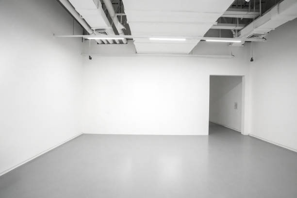 istock White walls and grey cement floors in the interior space 1181421644