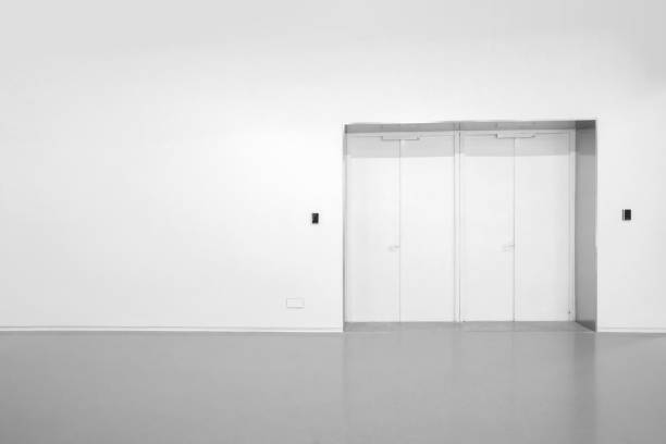 istock Doors in empty rooms and grey cement floors 1181421758