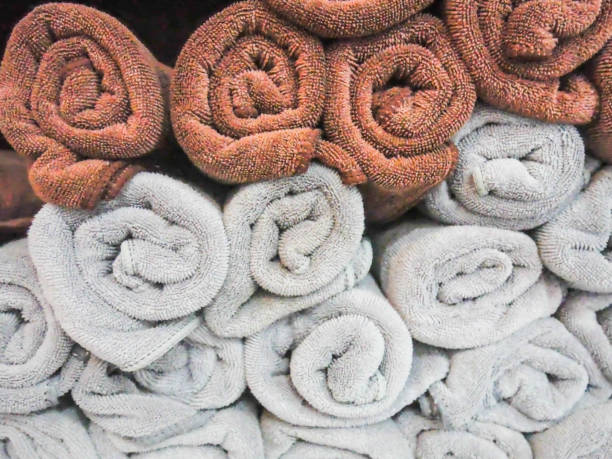 istock spa towels, towels stacked rolls. texture background 1181422166