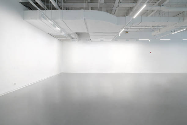 istock White walls and grey cement floors in the interior space 1181422389