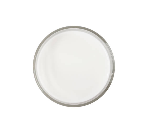 istock Milk in glass cup isolated 1181423057