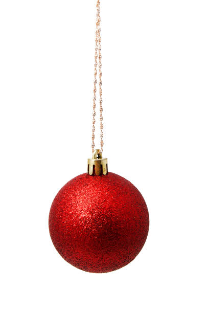 istock Hunging red christmas ball isolated on a white 1181423102