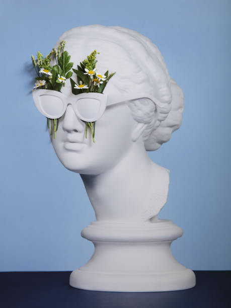 Floral collage with Greek Goddess wearing sunglasses Analog collage with plaster head model (mass produced replica of Head of Aphrodite of Knidos) and plants bust sculpture photos stock pictures, royalty-free photos & images