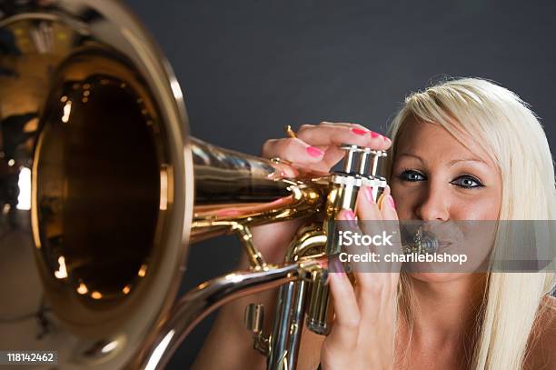 Pretty Blonde Female Trumpet Player Stock Photo - Download Image Now -  Adult, Beautiful People, Blond Hair - iStock