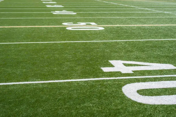Photo of football field yard lines and numbers