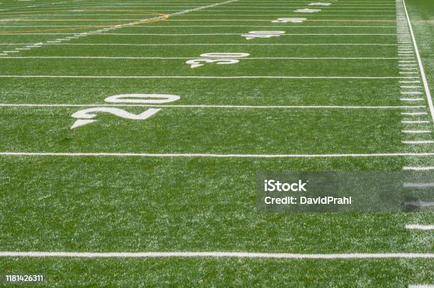 Perspective View Of Marker Lines Down Empty Football Field Stock Photo - Download Image Now