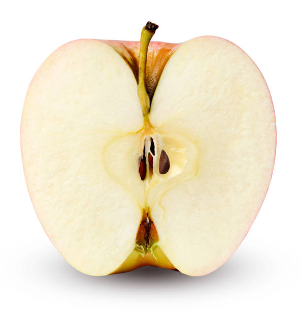 istock Half ripe apple close-up isolated on a white background. 1181428004