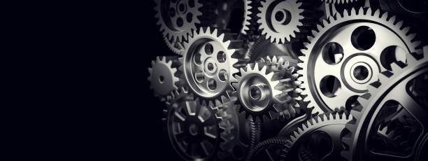 istock Mechanism, gears and cogs at work. Industrial machinery 1181428248