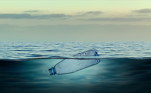 istock Plastic bottle, pollution that floats in the ocean 1181430920