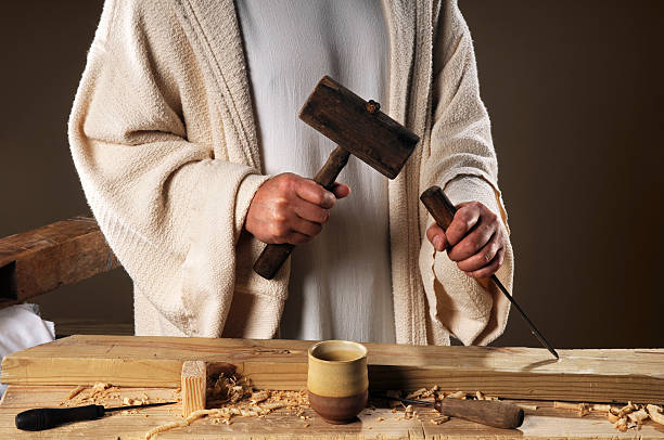 Jesus Hands With Carpenter's Tools stock photo