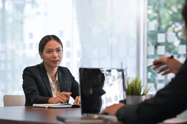 istock Discuss business with two people business consulting on laptop computer. 1181436276