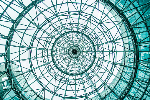 Looking through the circle glass roof from bottom