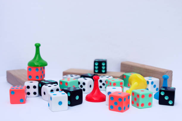 istock mix of dice, blocks, and movers from board games on white background 1181442069