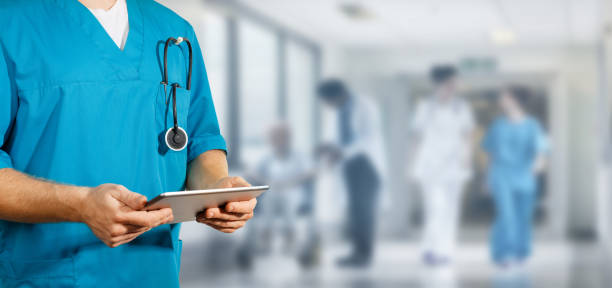 Concept of global medicine and healthcare. Doctor holds digital tablet. Diagnostics and modern technology stock photo