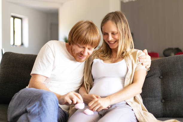 istock Happy couple expecting daughter 1181443651