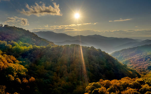 aerial view picture of sunset in pisgah national forest at the Appalachian Mountains with different foliage colors stock photo