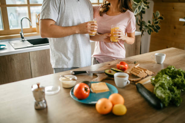 istock Young cheerful spouses enjoying morning time together 1181445704