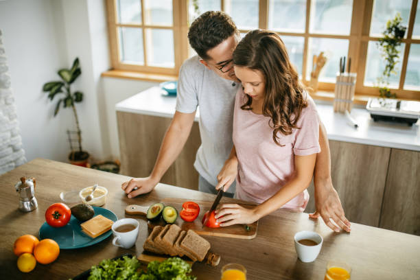 istock Young cheerful spouses enjoying morning time together 1181445844