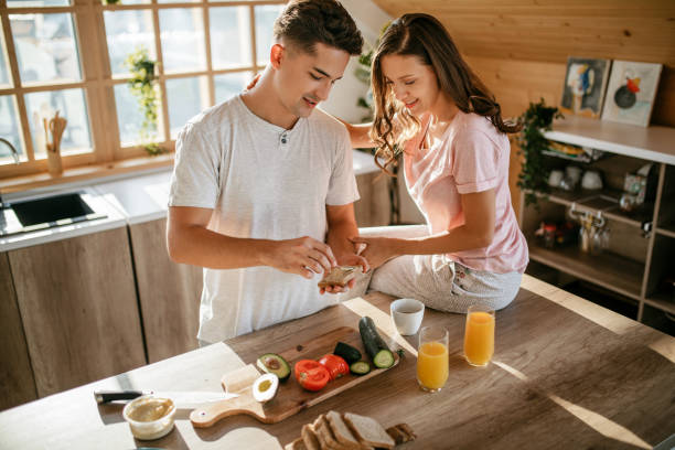 istock Young cheerful spouses enjoying morning time together 1181446681