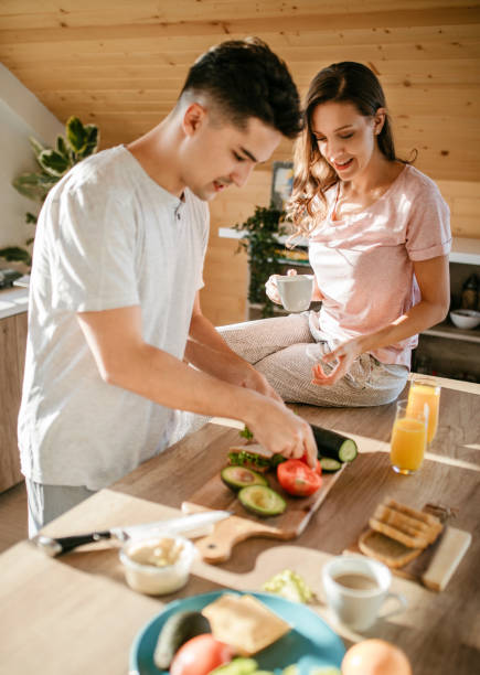 istock Young cheerful spouses enjoying morning time together 1181446720