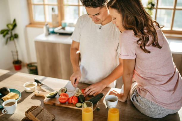 istock Young cheerful spouses enjoying morning time together 1181446751