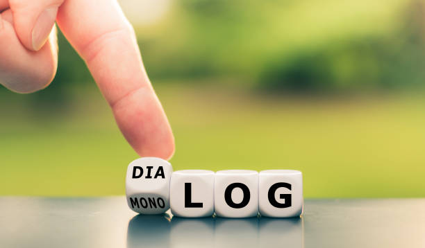 istock Hand flips a dice and changes the German word 