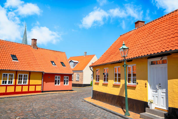 istock Street with yellow buildings and cooblestone 1181448316