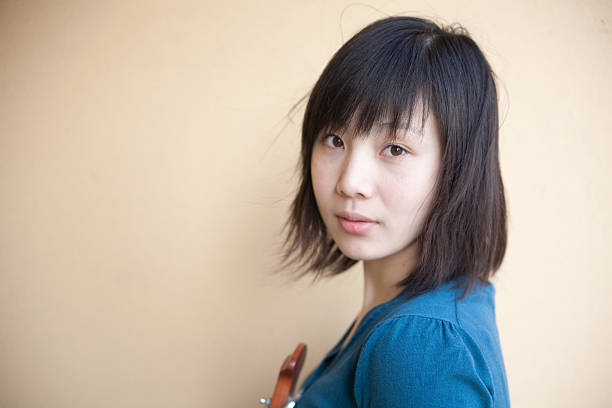 istock woman and guitar 118144862
