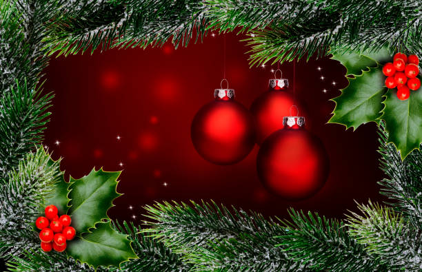 istock Red Christmas baubles with Christmas green on a red background 1181449512