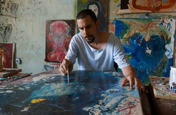 istock Artist in atelier 1181449941