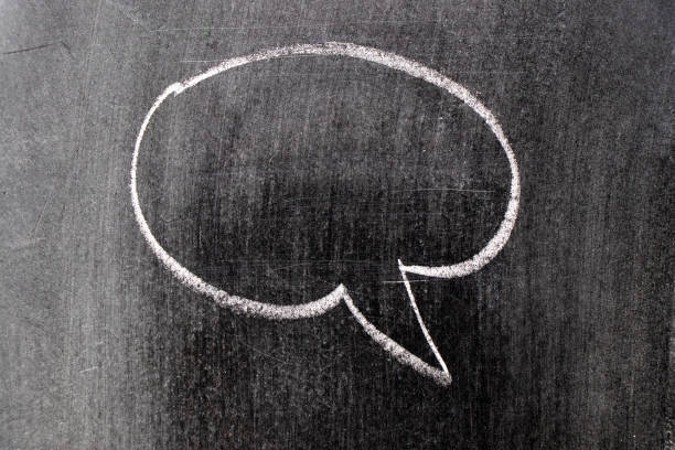 istock White chalk hand drawing in round bubble speech shape with blank space on blackboard background 1181451356