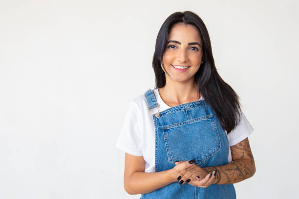 istock Beautiful cheerful young lady looking at camera 1181452199