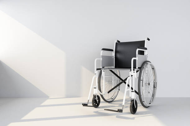 istock wheelchair in an empty room 1181452495