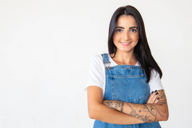 istock Attractive young brunette with crossed arms 1181453978